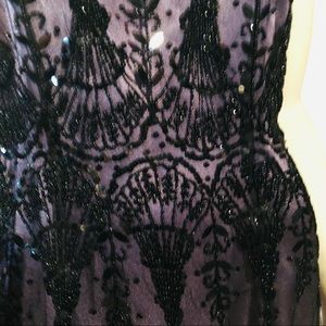 Rimini Special occasion beaded long dress in a beautiful soft purple.  Size 8